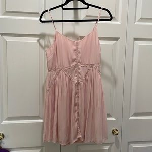 Pink sundress with lace detailing